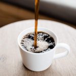 Coffee poured into cup