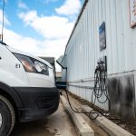 UM-owned electric van at a fleet charging station.