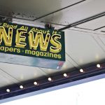 neon sign that reads, "Read all about it, NEWS"