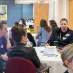 attendees having a discussion at an Experiential Learning Gathering
