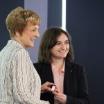 Zoie Hetletvedt receives her nursing pin from College of Nursing dean Dr. Netha Dyck.