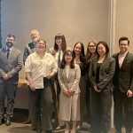 Master of Human Rights program students who just presented their practicum prapers and thesis reports pose for a group photo