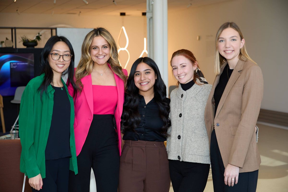 Irena Tonnu and fellow semi-finalists posing for group photo at Steelcase University.