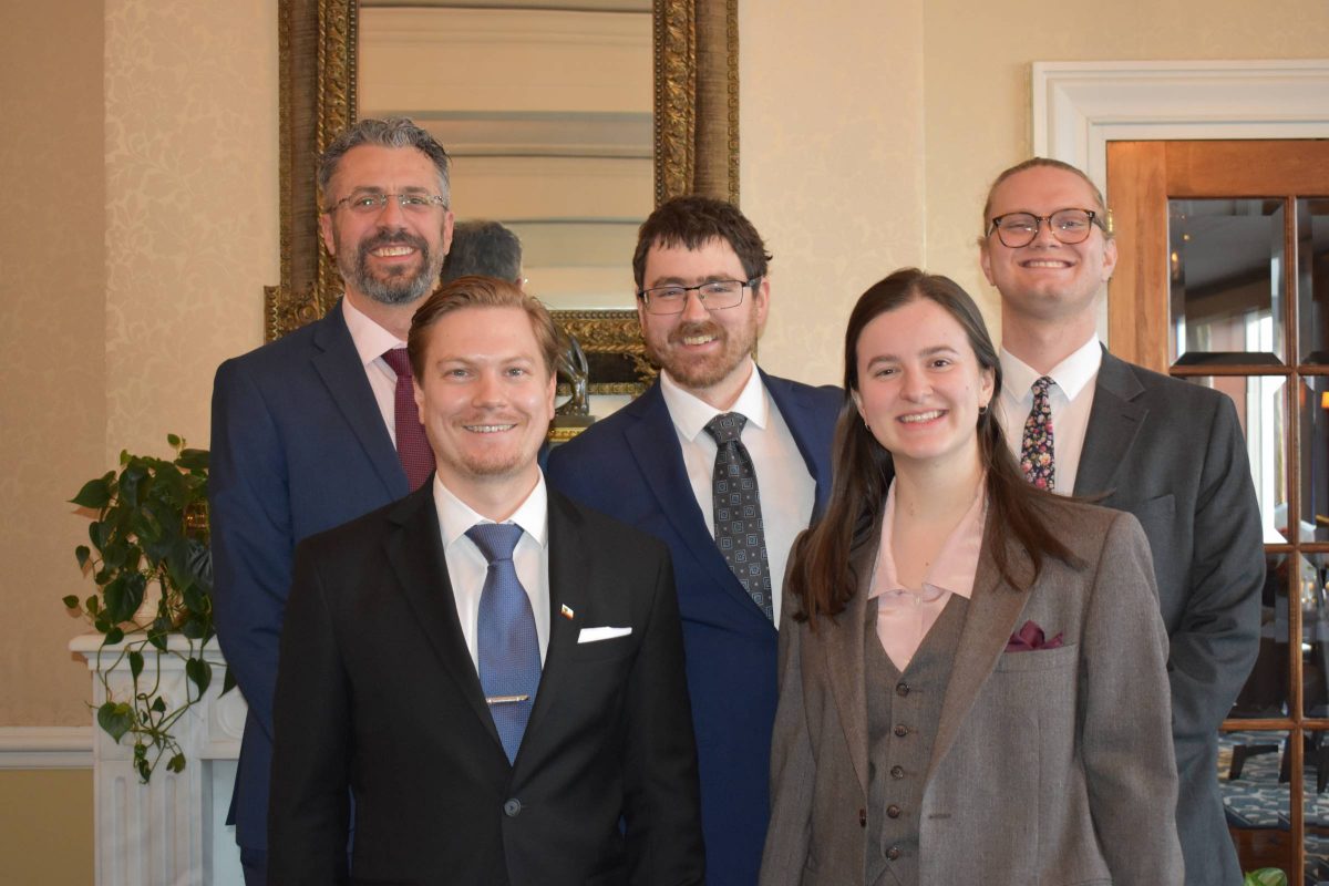 Team Manitoba left to right: Julien Bédard, coach (Justice Canada), Bradley Légaré (3L), Brent Tichon (2L), Nadine Plourde (2L), and Alexander Bastin (2L) [Missing from the photo is researcher, Samantha Pearce (2L)]