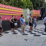 Noel Cruz Venegas leads an outdoor dance class