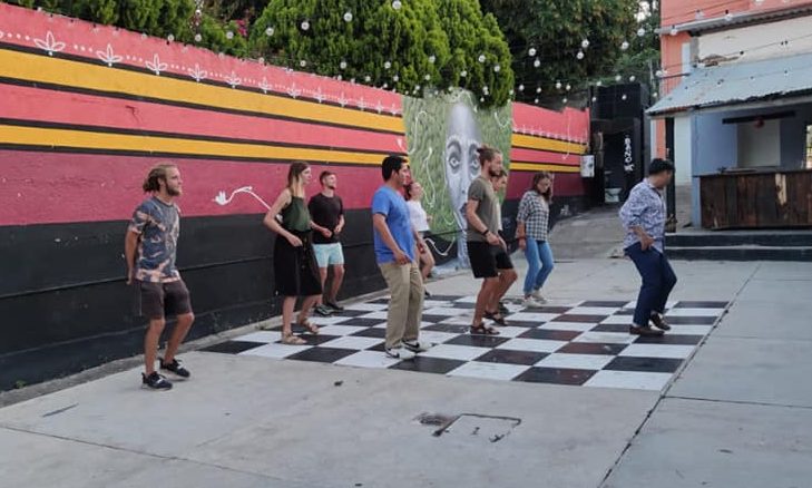 Noel Cruz Venegas leads an outdoor dance class