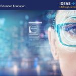 Woman with glasses looks blue computer screen reflections