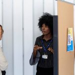 Faith Olarinde presents to a judge at research day 2023