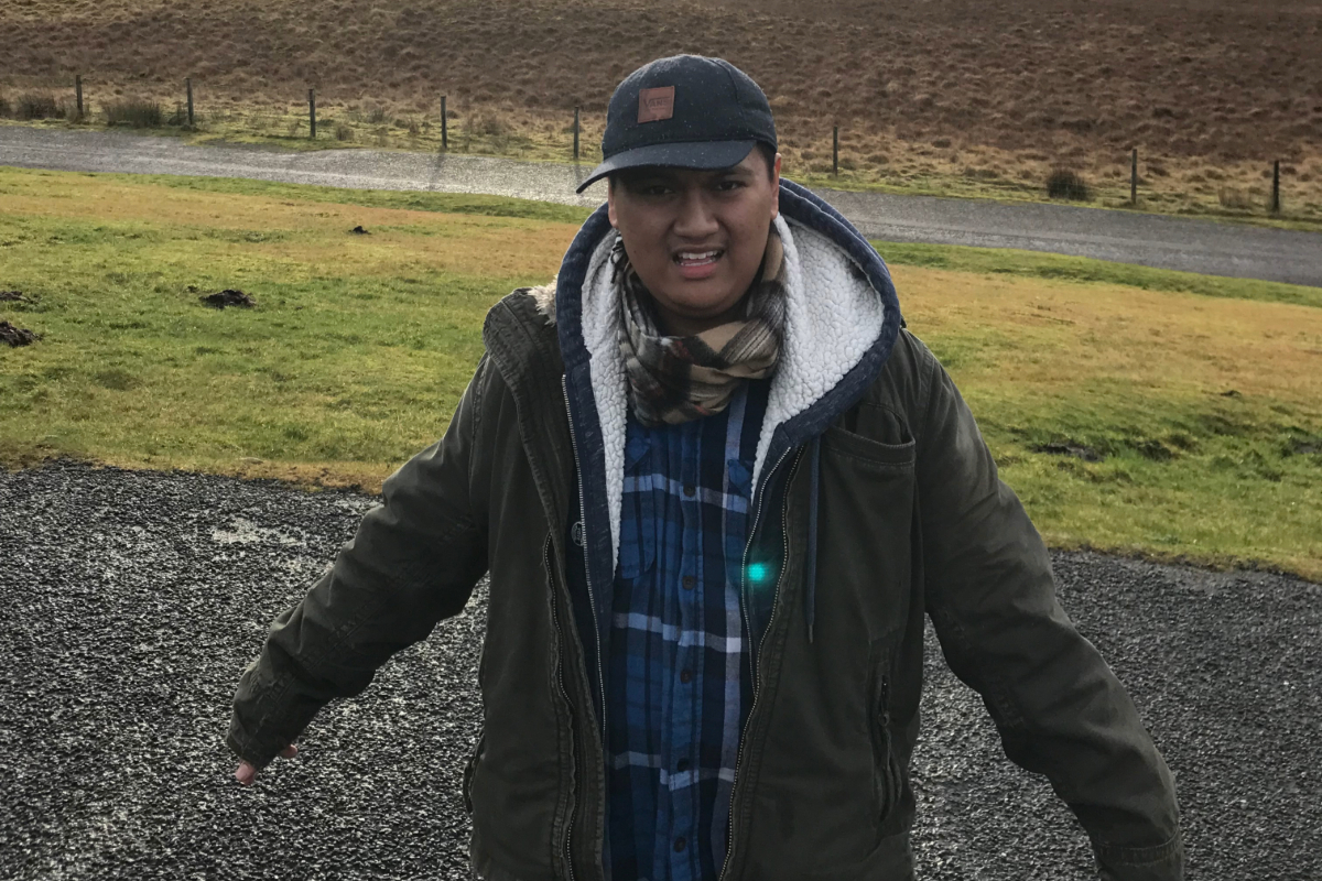 Men with a hat and green jacket