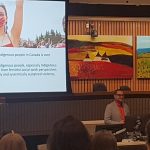 Photo of Marc Kruse giving a presentation in the Moot Courtroom