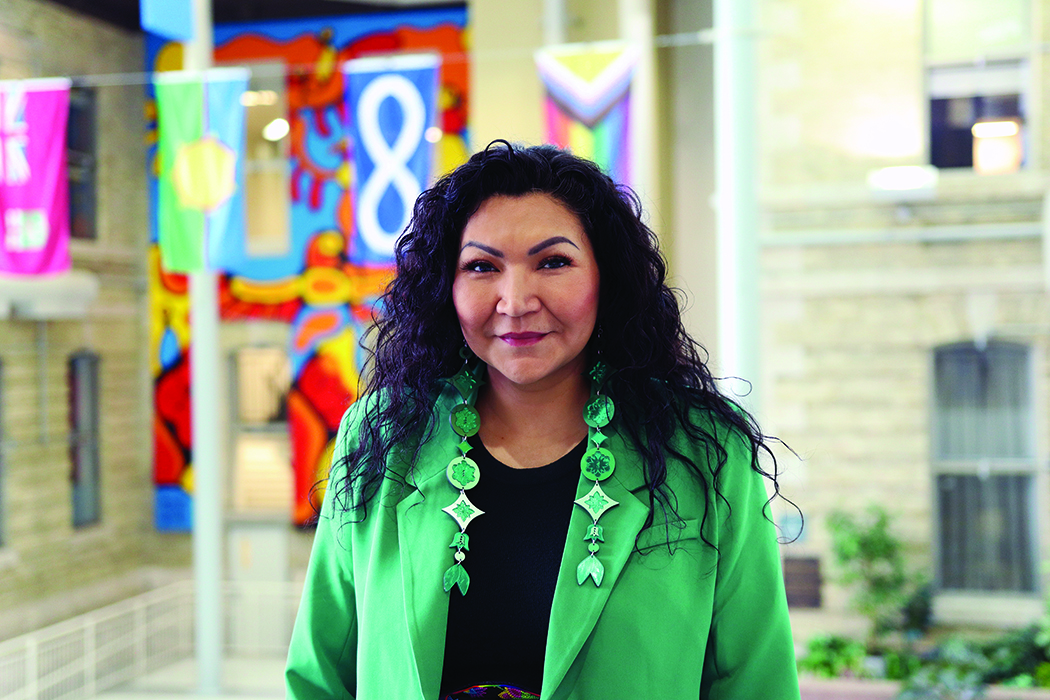 Margaret Hart stands in the Brodie atrium at Bannatyne campus.