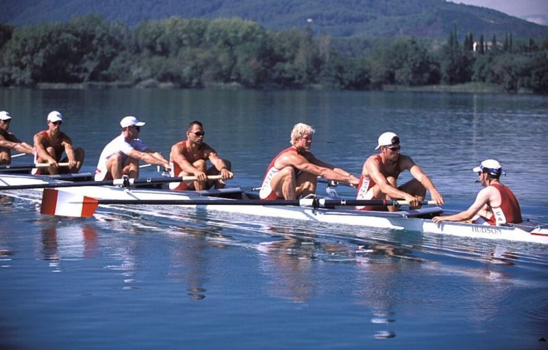 A team of rowers in their boat