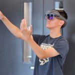 A person wearing an augmented reality headset