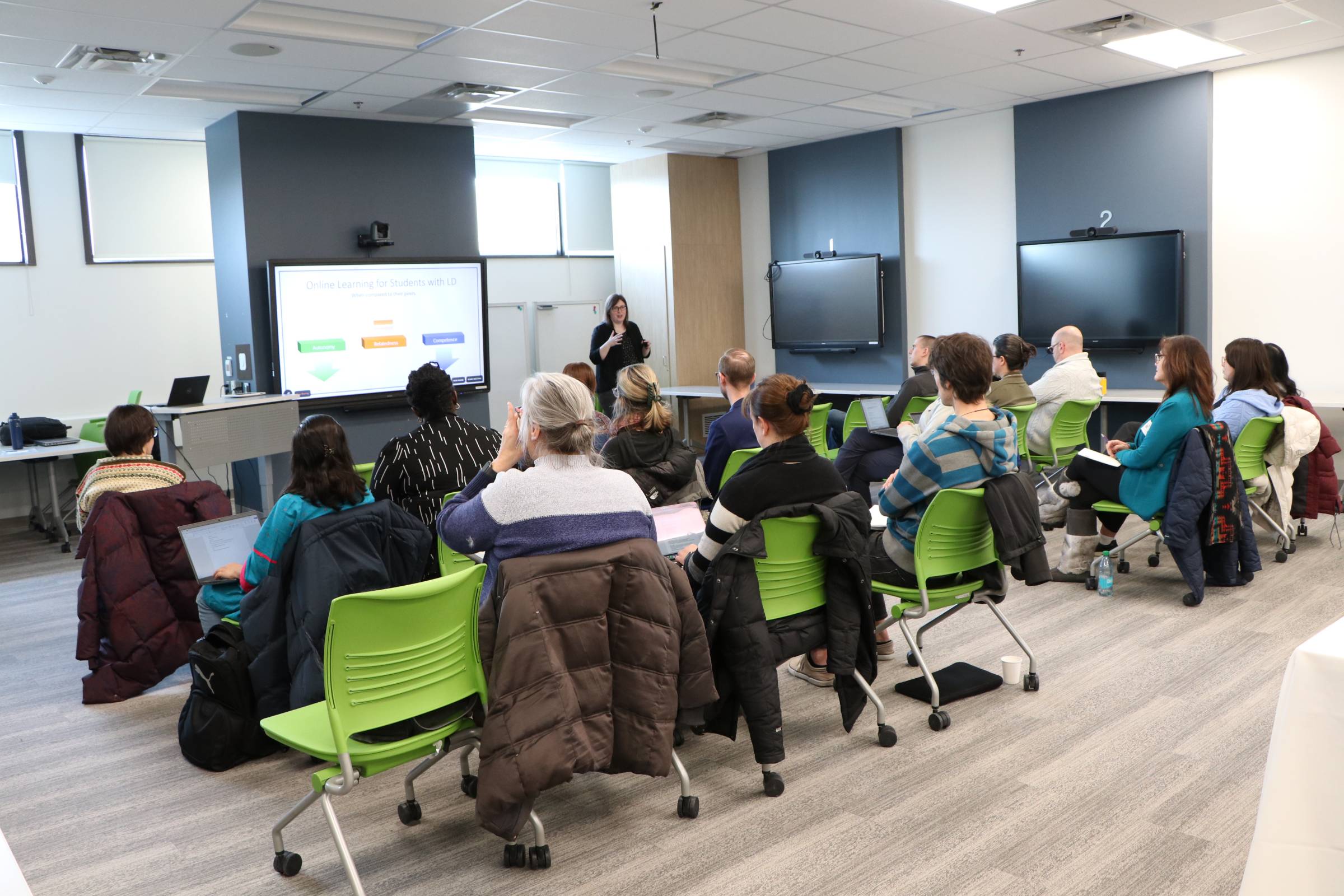 Participants listening to a presenter at session two of The Centre's Teaching and Learning Colloquium Series.
