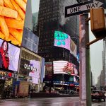 A Times Square billboard features Manitoba designers Koyle TJN amid the busy streets at New York Fashion Week.
