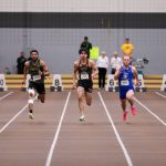 Tyrell Davis sprints on the track at UM