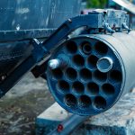 A missile launcher on the side of an aircraft. Photo credit: Orbital 101 Studio