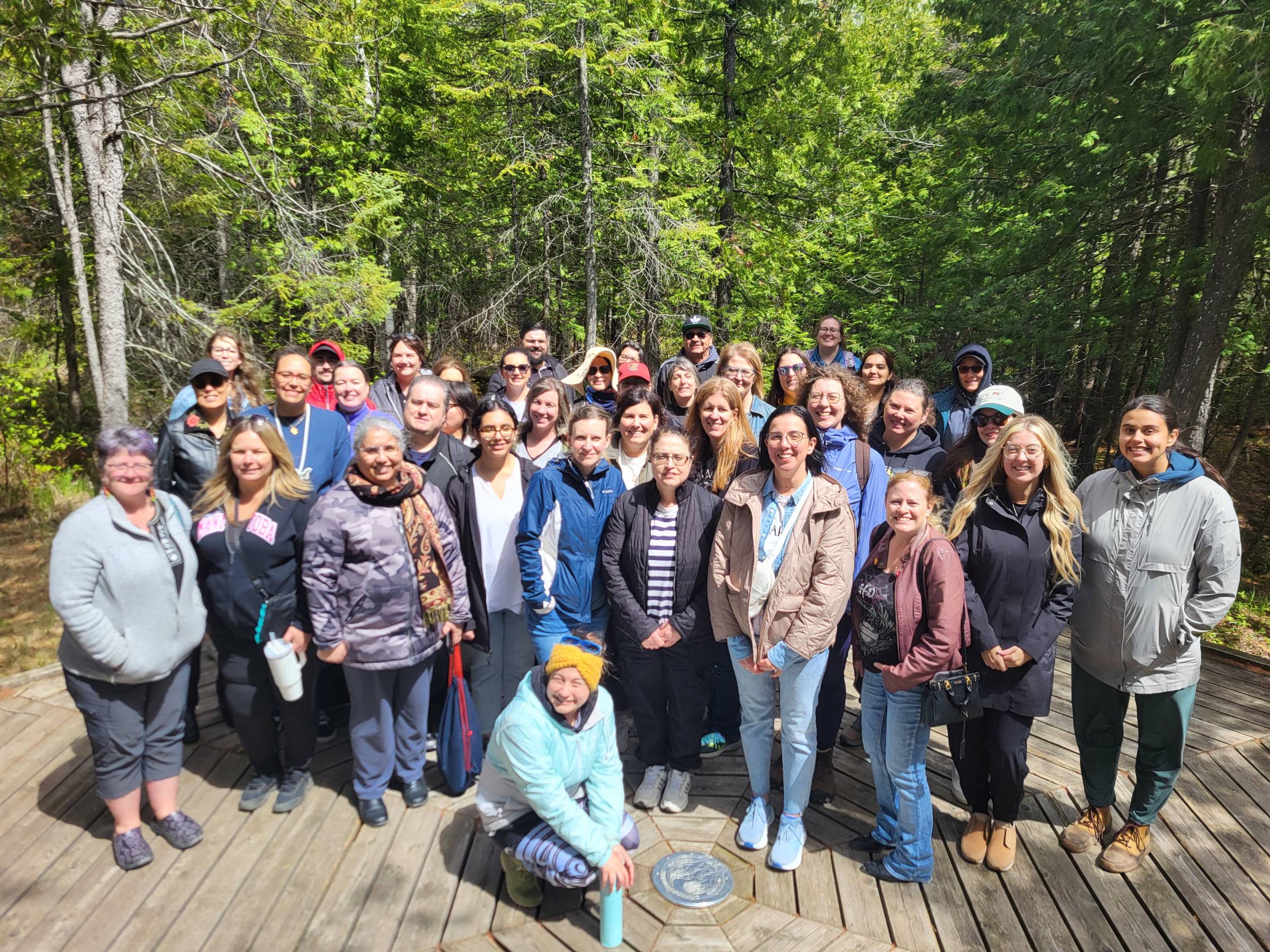 group of staff and faculty at Brokenhead Wetland Interpretive trail