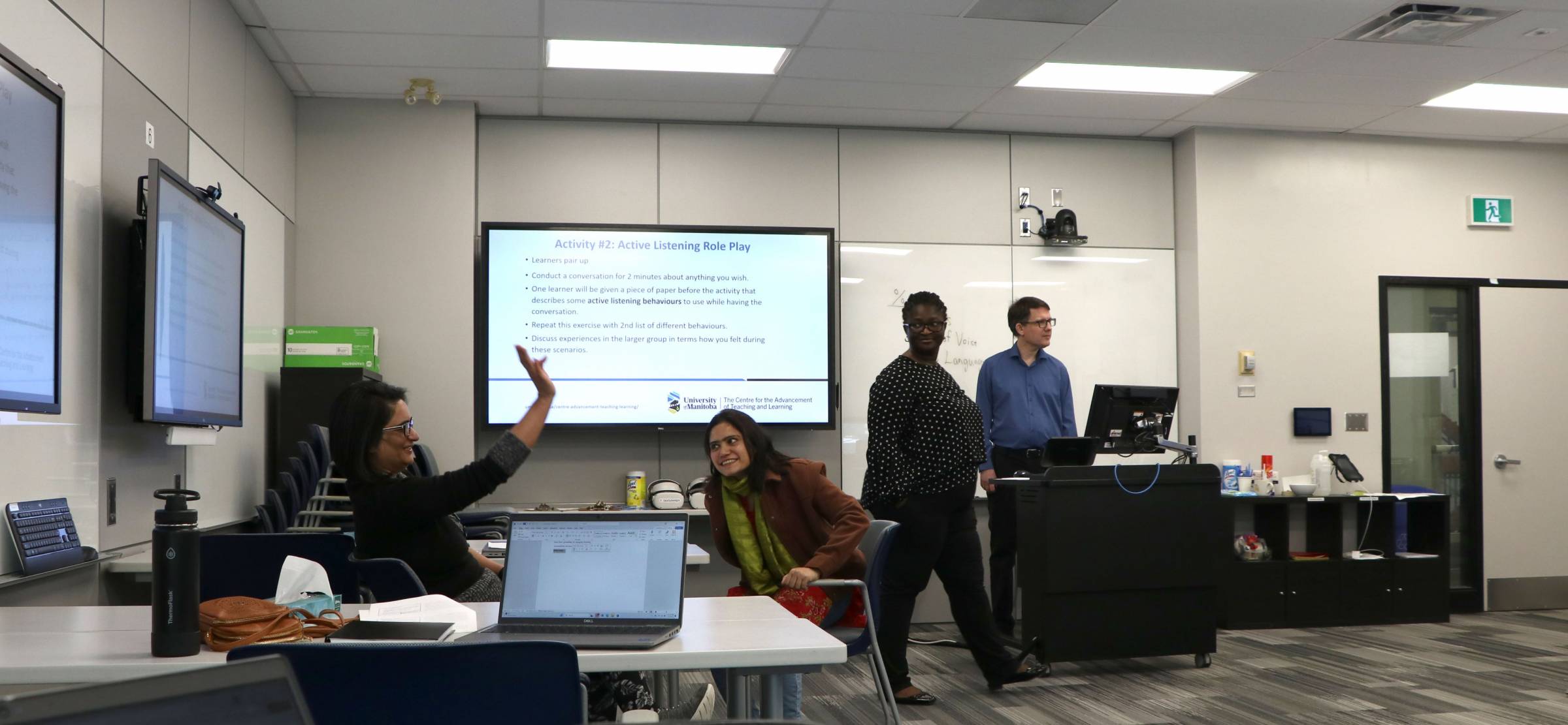 Two facilitators and two participants in the Effective Communication workshop at The Centre.