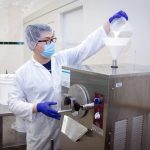 Technician works on food manufacturing processes