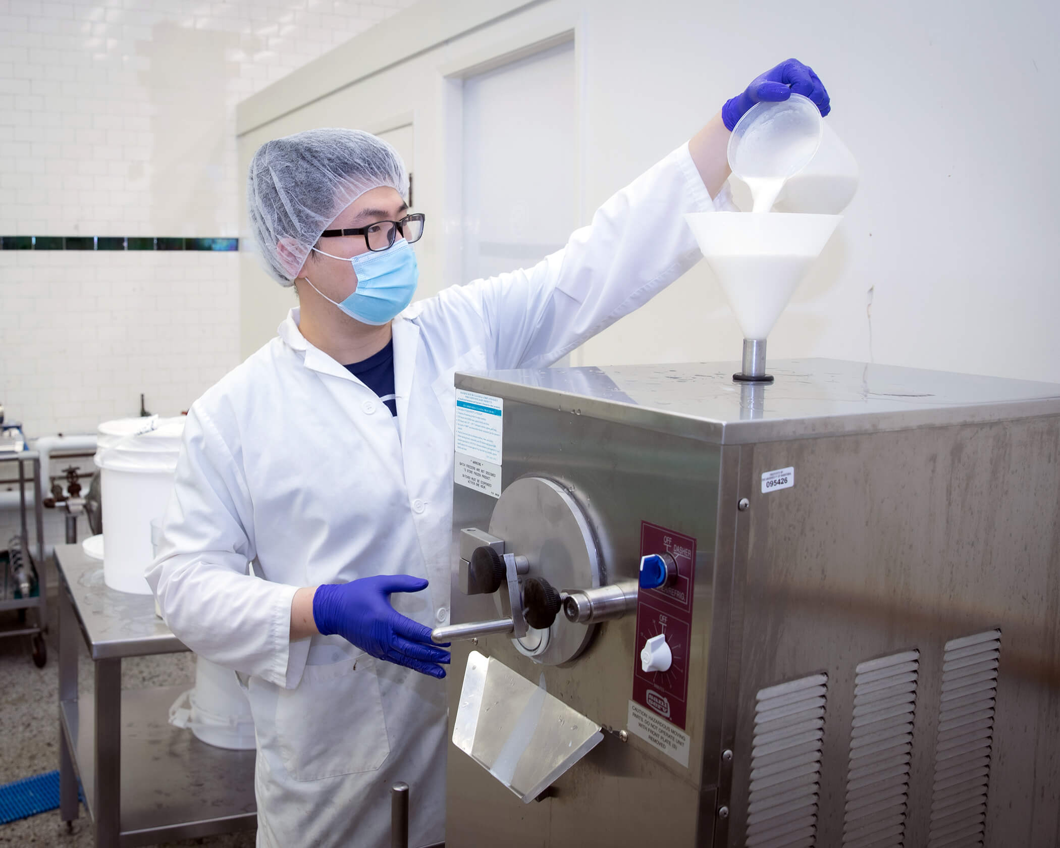 Technician works on food manufacturing processes