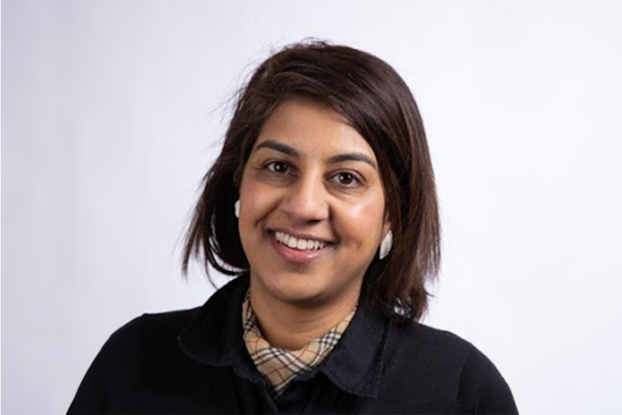 Headshot of Punam Mehta in front of a white backdrop