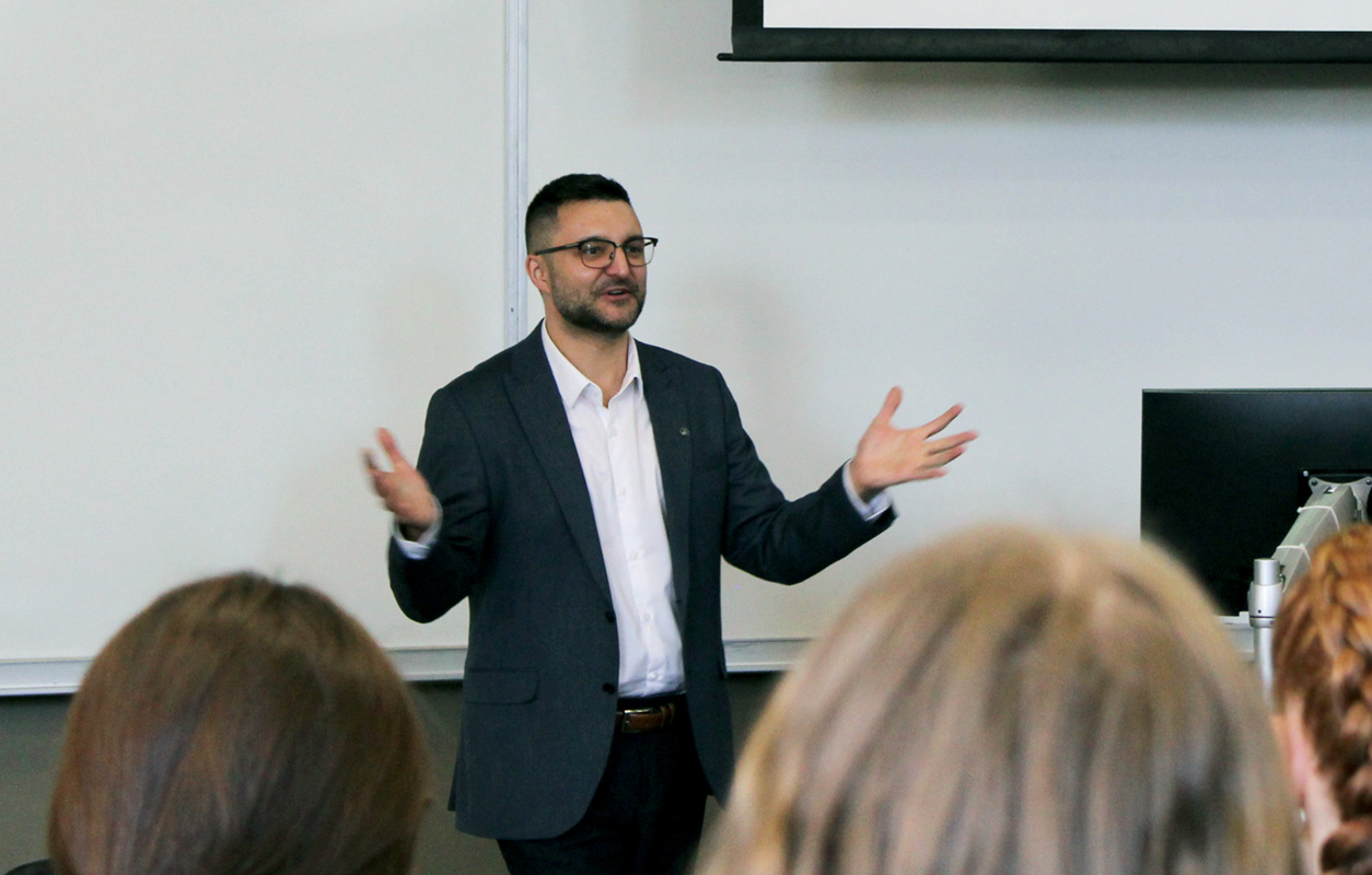 Dr. Rusty Souleymanov lecturing in front of students