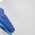 someone hand cleaning a surface