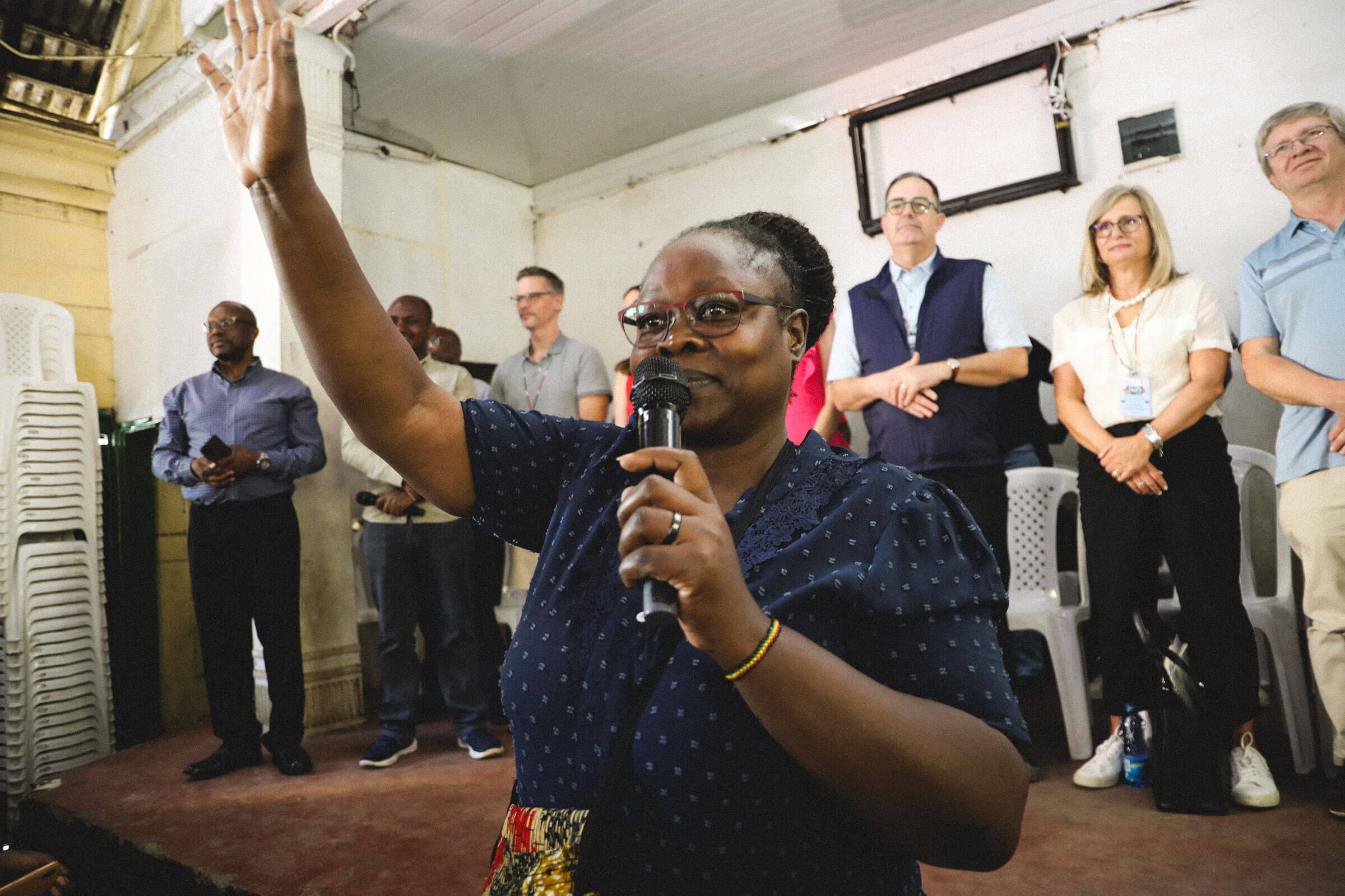 Joyce, a sex worker who is HIV-positive, led the community in song as a thank you to the research team.