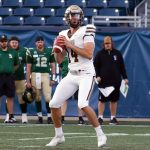Jackson Tachinski prepares to throw a pass