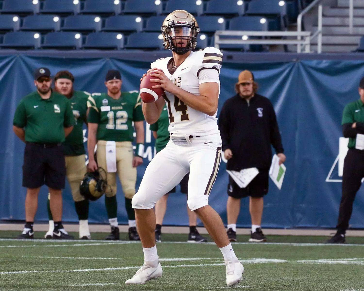 Jackson Tachinski prepares to throw a pass