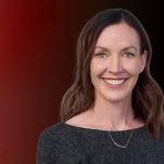 Headshot of Dr. Cheryl Glazebrook agaisnt a red-black gradient background for TedX Winnipeg.