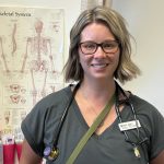 Erin Ryback in a clinical environment.