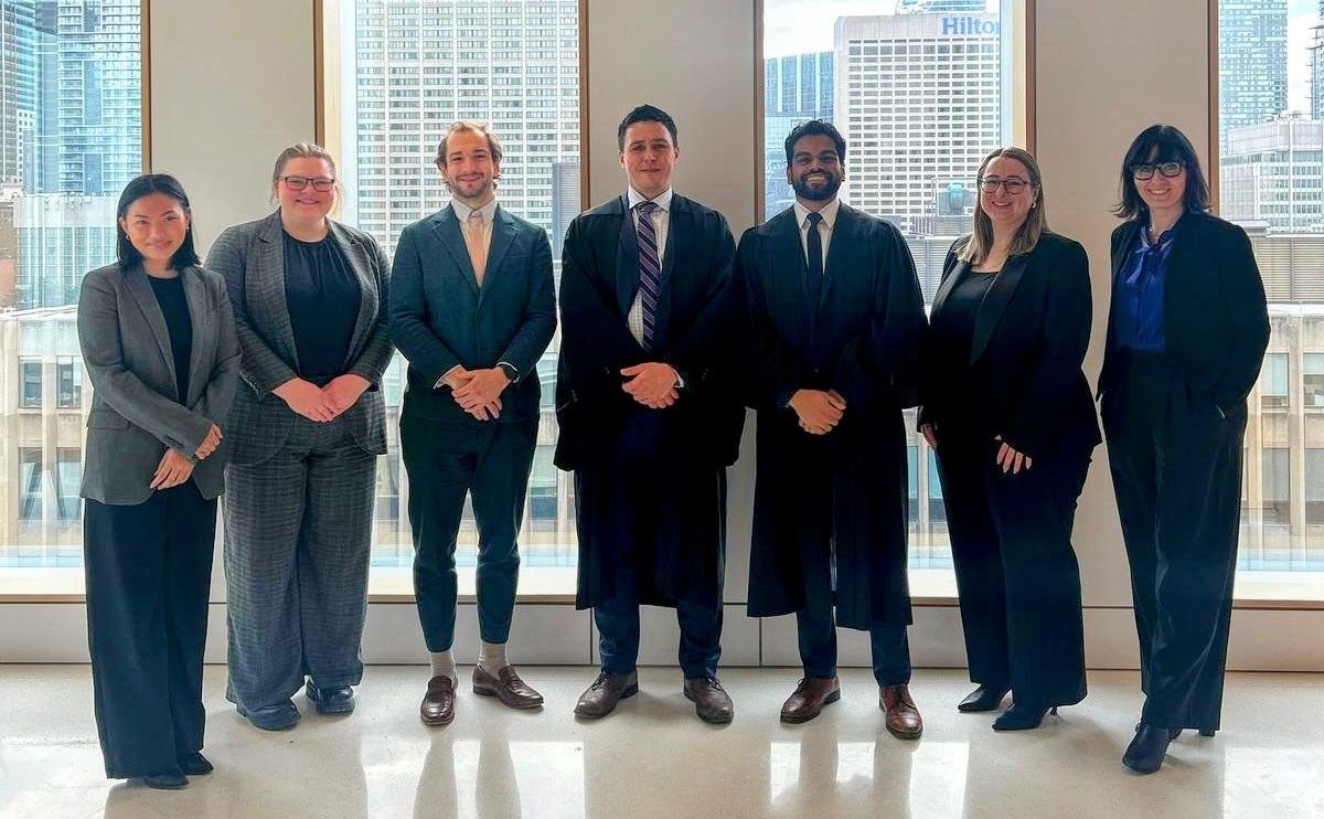 Photo of Gale Cup Moot Team and Coaches left to right Gale Cup Moot Team (left to right): Denise Sarmiento, Kaitlyn Clarke, Andrew Bergen, Derek Zaporzan, Sameer Harris, and Coaches Ashleigh Smith and Dayna Queau-Guzzi (both Manitoba Justice). Photo source: Sameer Harris.