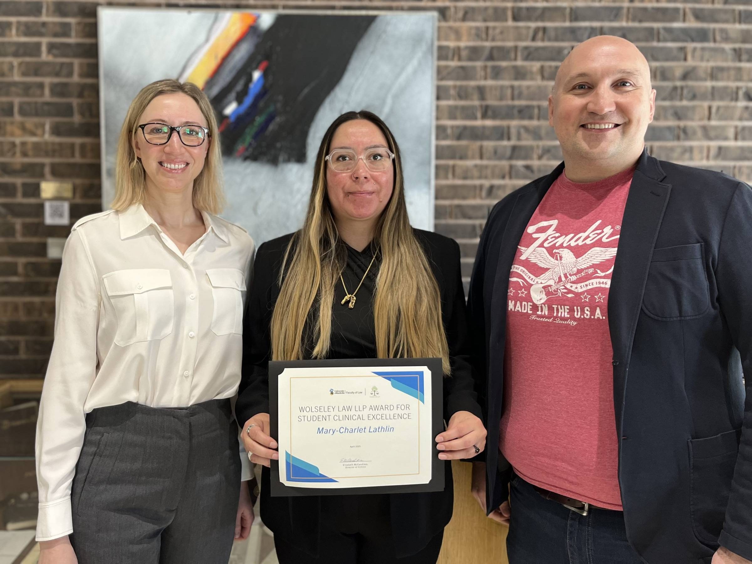 Left to right: Elizabeth McCandless, Director of Clinics, Faculty of Law; Mary-Charlet Lathlin (3L), inaugural winner of the Wolseley Law LLP Award for Student Clinical Excellence; and Gerrit Theule [JD/15], founding partner of Wolseley Law LLP.