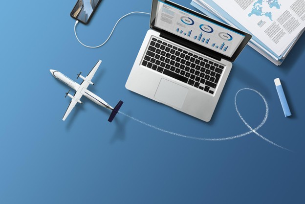 Microsoft copilot image. Plane circling around a laptop