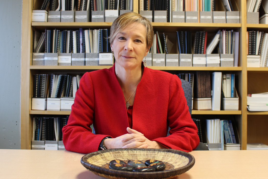 Dr. Josée Lavoie sitting at a table.