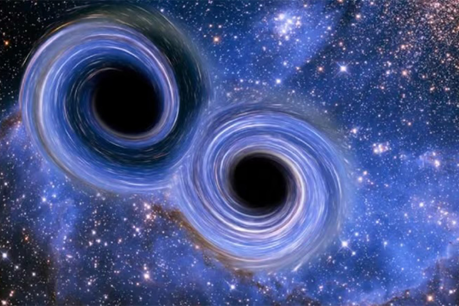 An artist's impression of two black holes merging, which can be detected on Earth through the gravitational waves the collision creates. (Victor de Schwanberg/SPL)