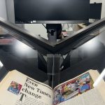 Image of print book in large-format scanner at UM Libraries digitization centre.