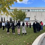 group of indigenous students stand outside Faculty of Education building