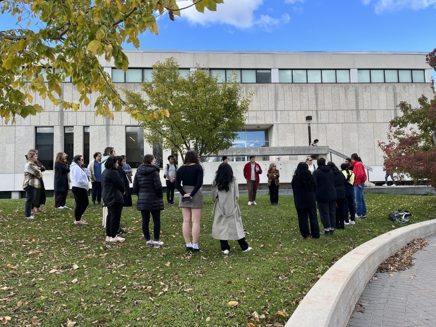 group of indigenous students stand outside Faculty of Education building