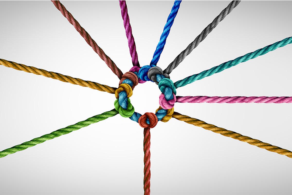 Various colours of rope come together in a circle