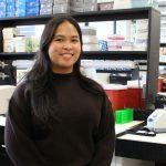 Portrait of Deanne Nixie Miao in a lab.