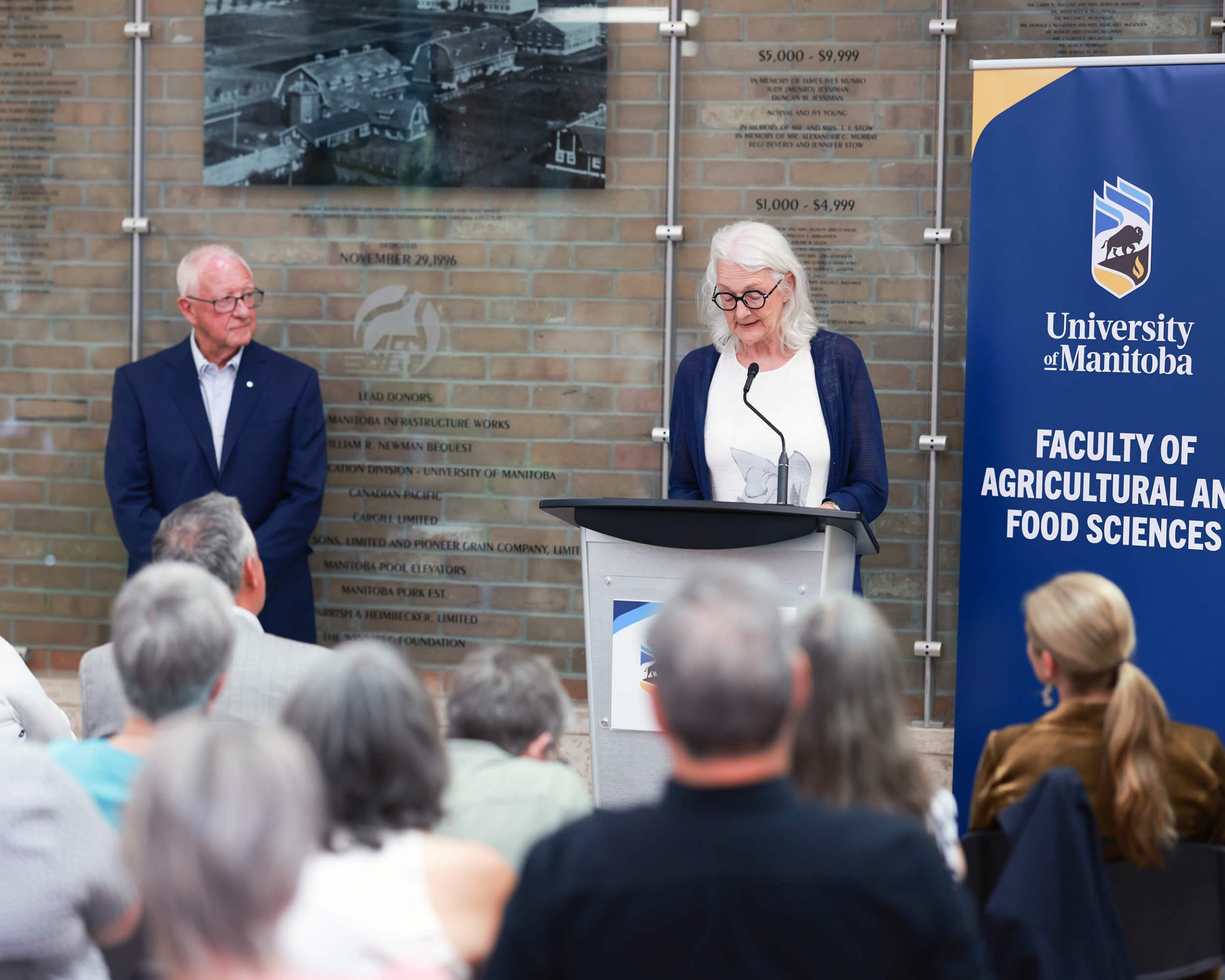 2025 Certificate of Merit recipient Kim McConnell is introduced by his nominator Dr. Karin Wittenberg