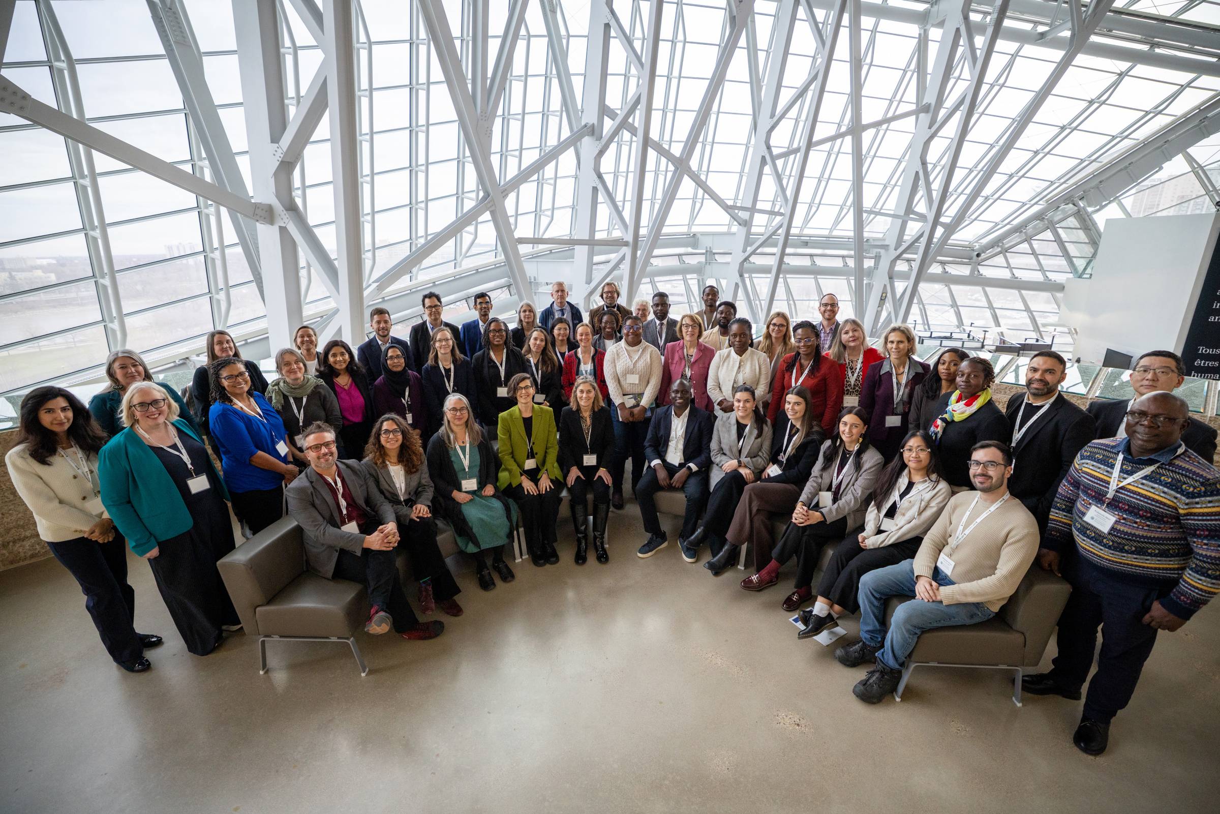 A group of people in a well-lit atrium space