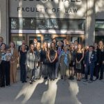 group photo of award recipients with donor in front of Robson Hall
